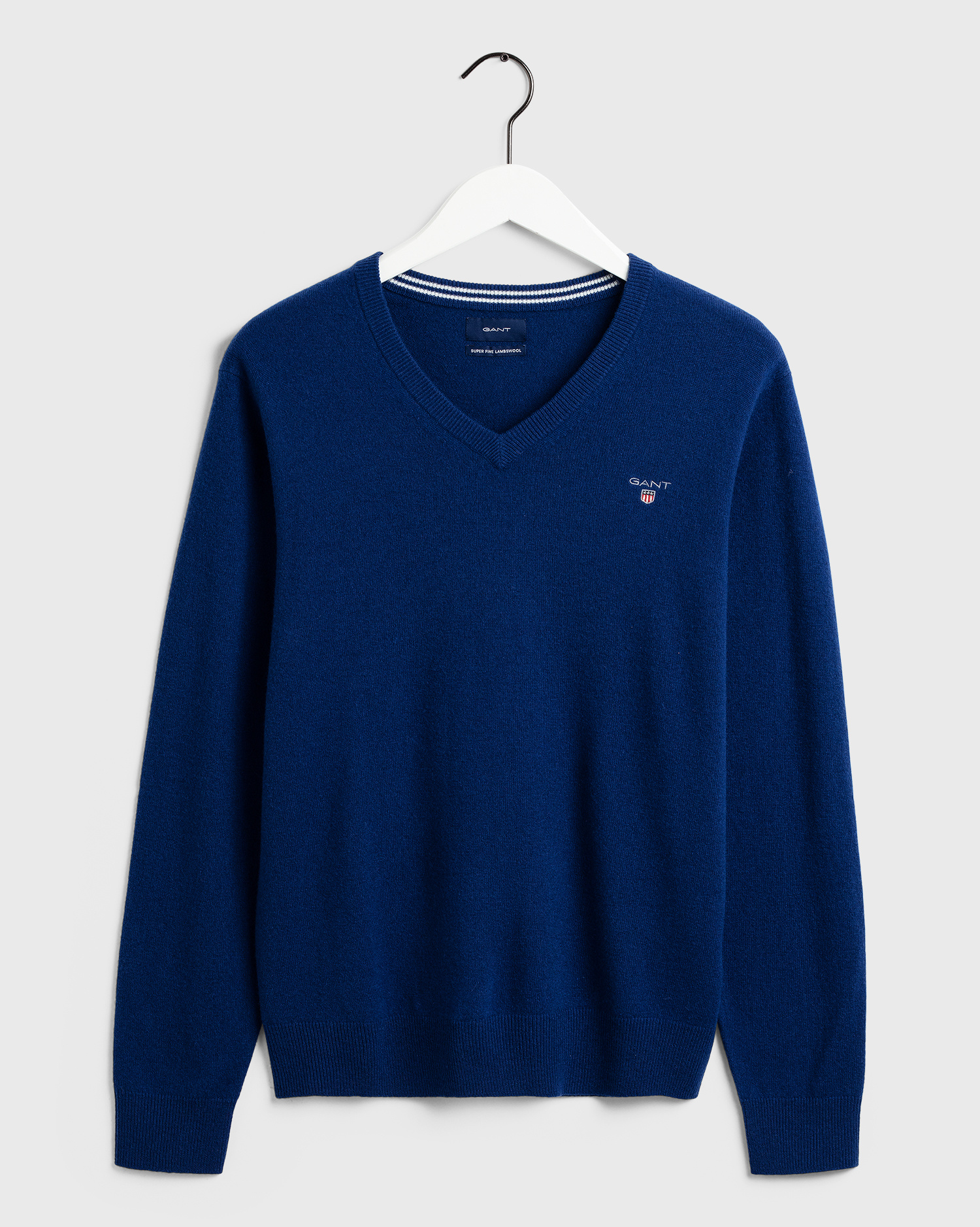 Pullover met v-hals lamswol blauw Bas de Mode Leiden