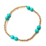 four turquoise gold coloured