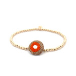 Button orange gold coloured