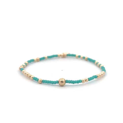 Dot one II turquoise gold coloured