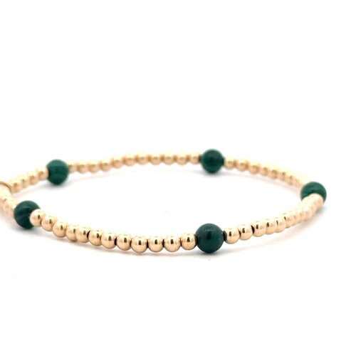 Dot 5 green gold coloured