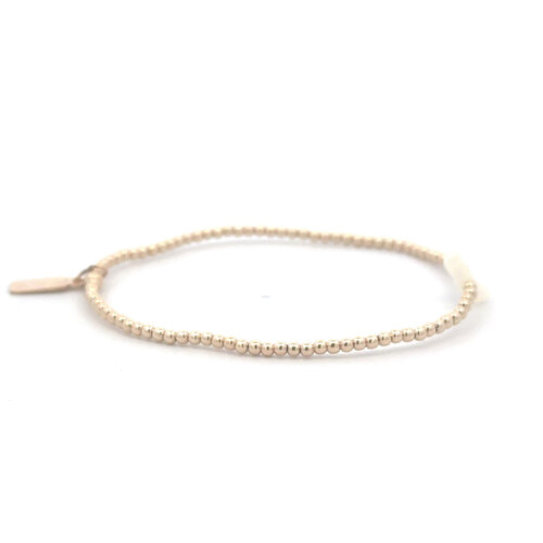 Cross small 2mm pearl gold coloured