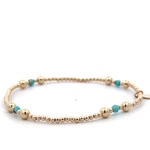 Four split turquoise gold coloured Four split turquoise gold coloured