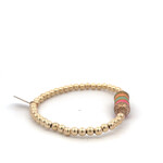 Bus luck charm multi peach gold coloured Bus luck charm multi peach gold coloured