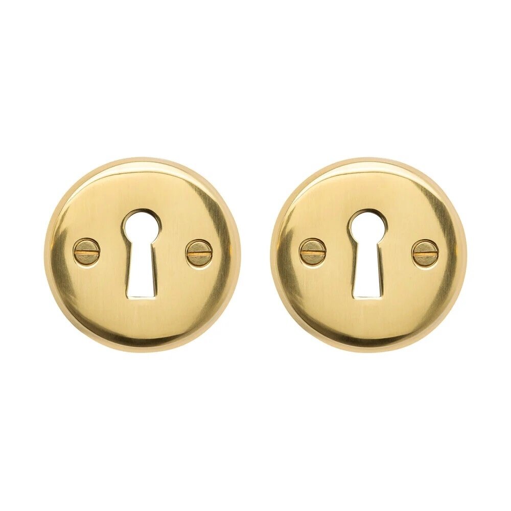 De Oude Deurklink Deurklink klassiek geveerd, messing gelakt, sleutelrozet, rond De Oude Deurklink Deurklink klassiek geveerd, messing gelakt, sleutelrozet, rond