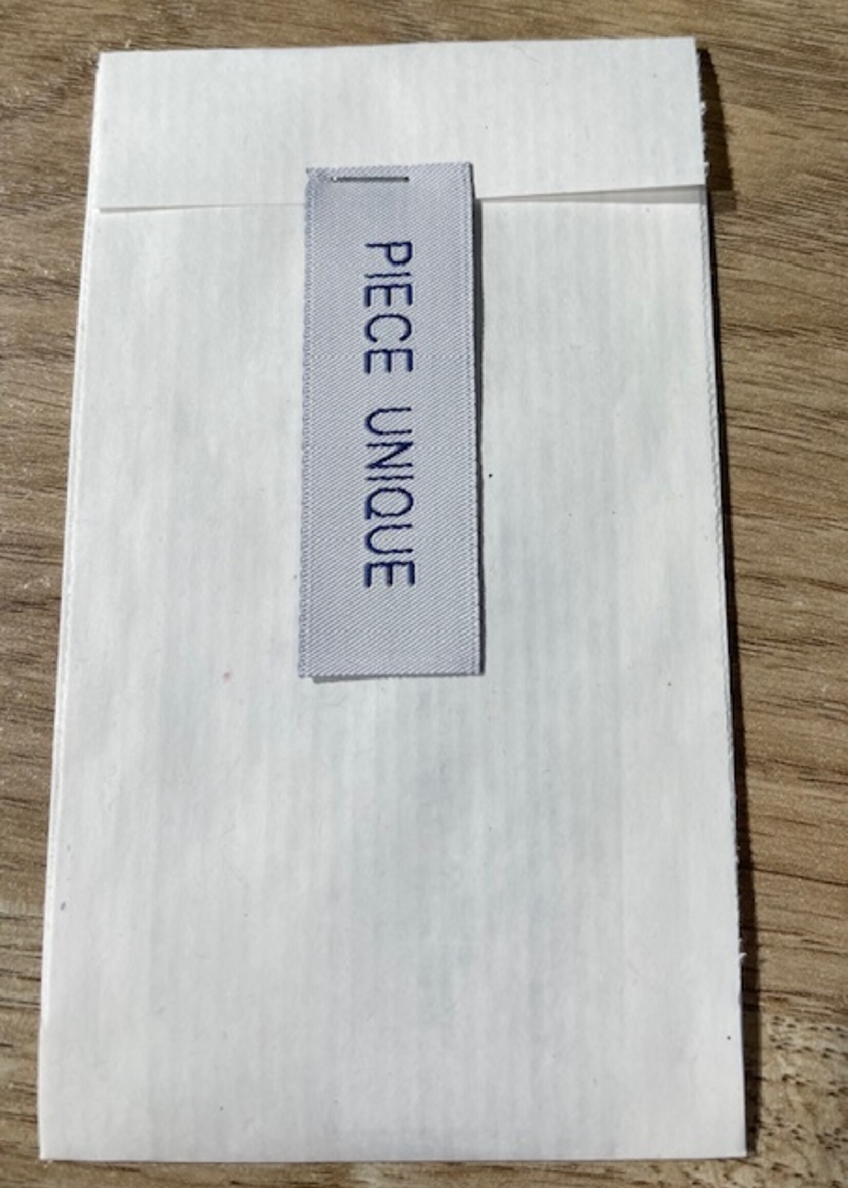 Label piece unique