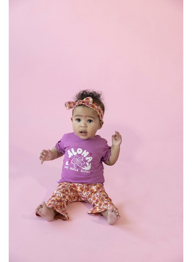 Flare broek AOP - Love Peace Aloha | Perzik