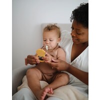 MUSHIE lion teether - soft yellow