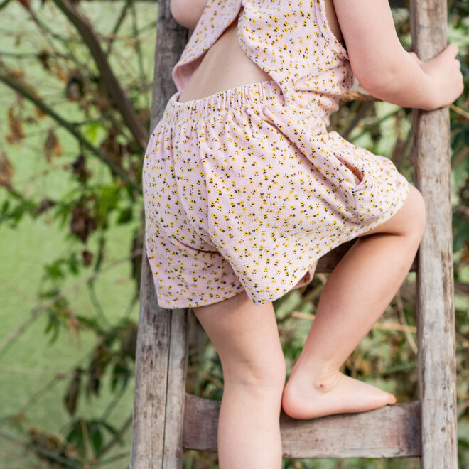 short jumpsuit - light pink with yellow flowers