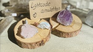 Amuletten met lichtcodes