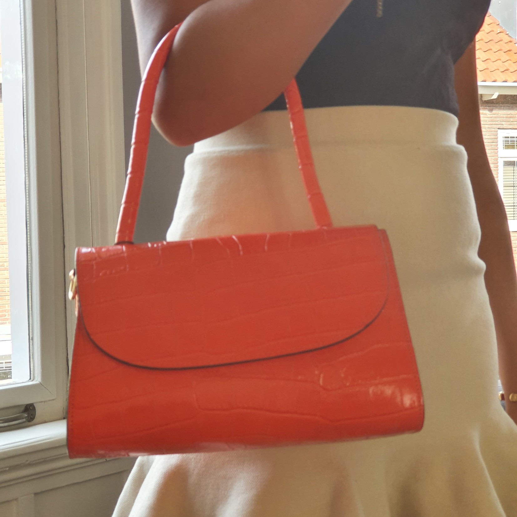 FIRST LADY FIRENZE Orangefarbene Ledertasche mit Aufdruck