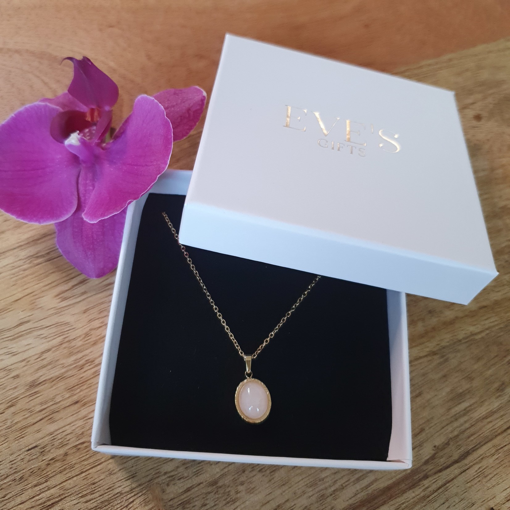 Eve's Gifts 14k gold plated stainless steel necklace with light pink stone