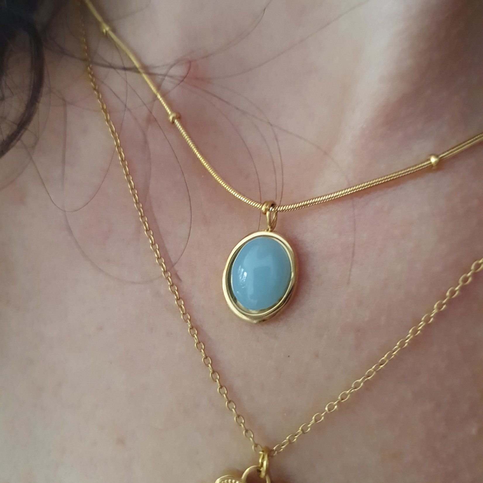 Eve's Gifts 14k gold plated necklace with light blue oval stone