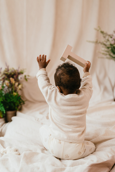 A Tiny Story baby pullover ecru melange TIN26129333