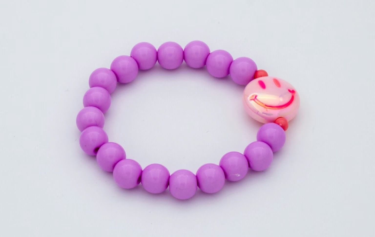 Colori Ribelle Armband lila smiley
