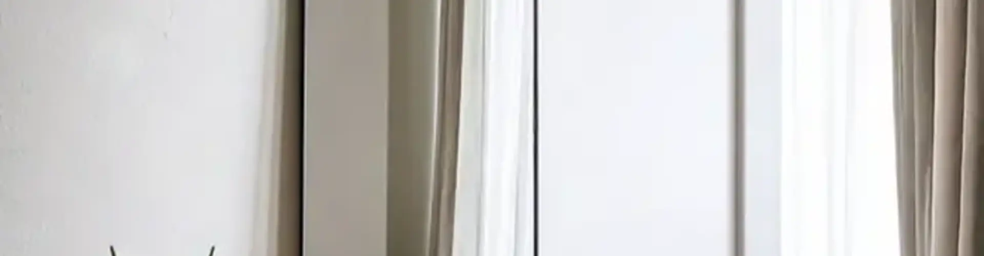 Een spiegel plaatsen zonder boren? Dit is de slimste oplossing voor je woning