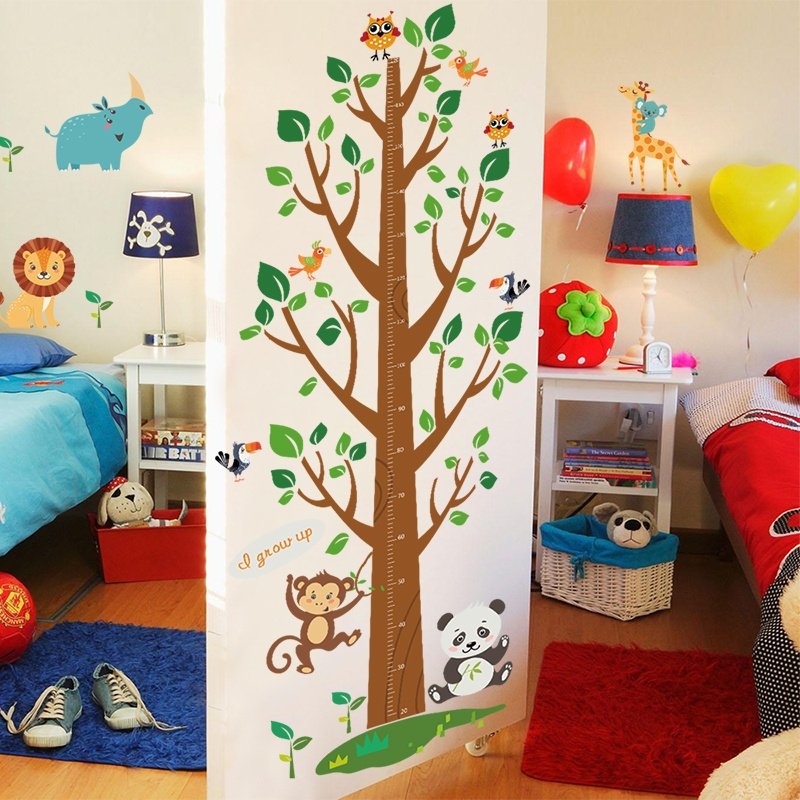 Muursticker boom groeimeter jungle beesten kinderkamer