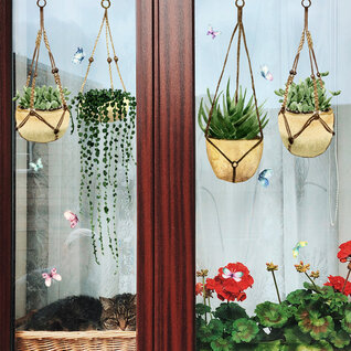Statische raamdecoratie planten en vlinders Statische raamdecoratie planten en vlinders