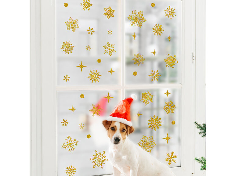 Statische raamdecoratie kerst sneeuwvlokken en sterren goud glitter herbruikbaar. Statische raamdecoratie kerst sneeuwvlokken en sterren goud glitter herbruikbaar.