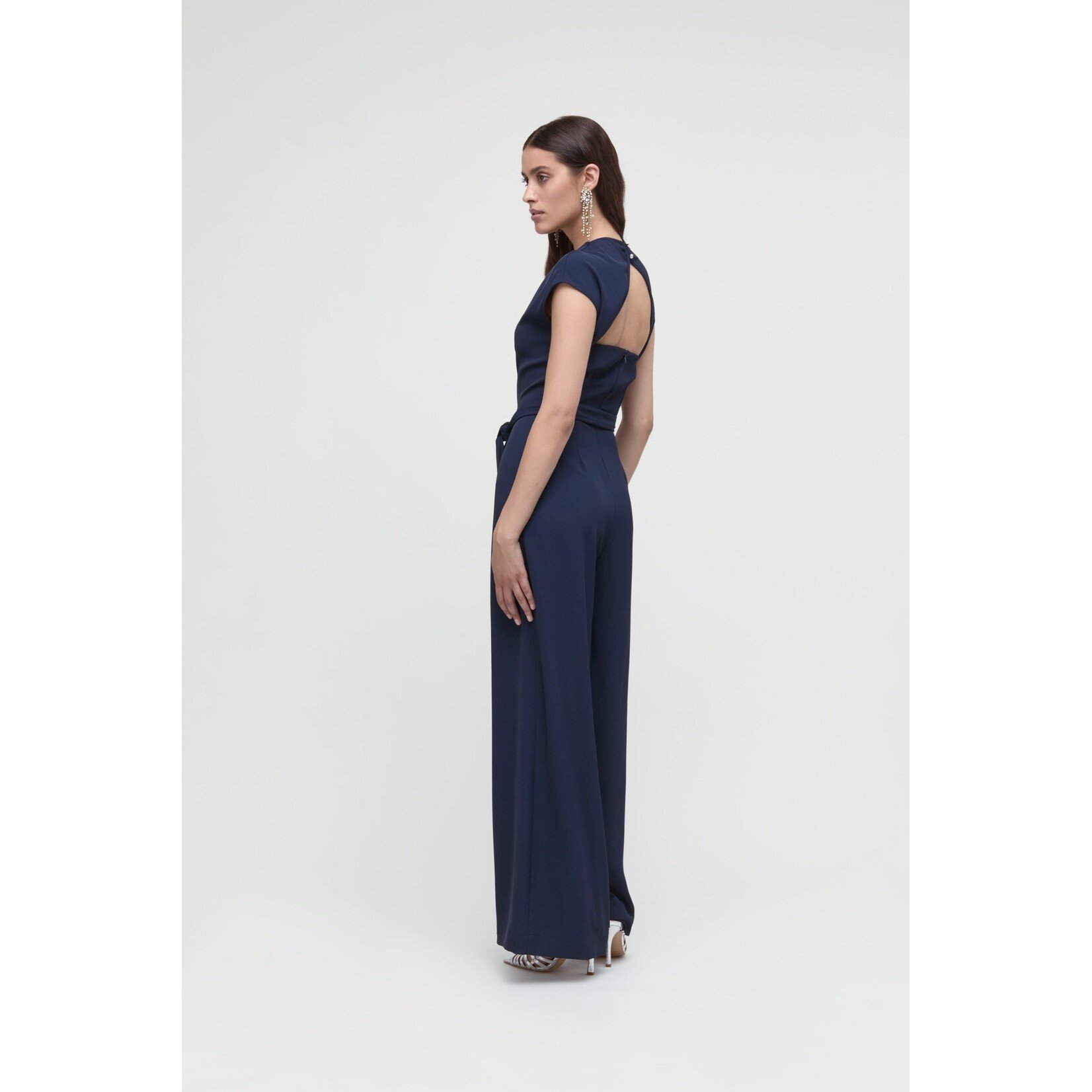 Même Road M8469P jumpsuit, 94% polyester en 4% elastan.