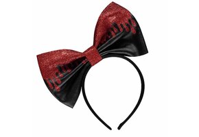 Met bloed besmeurde glitterhaarstrik