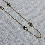14kt geelgoud collier met 8 sterretjes