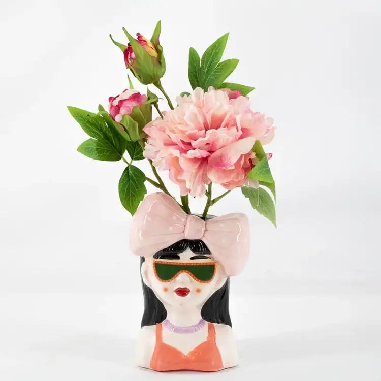 Pottery vase lady bow