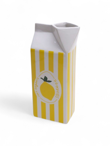 Earthenware lemon juice carton vase