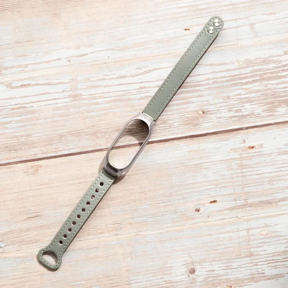 Strap-it Strap-it Bracelet cuir Xiaomi Mi Band 7 (gris)