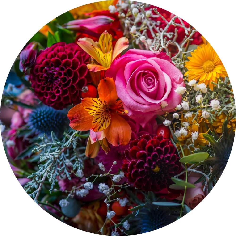 Muurcirkel Levendig en kleurrijk gemengd bloemboeket Muurcirkel Levendig en kleurrijk gemengd bloemboeket