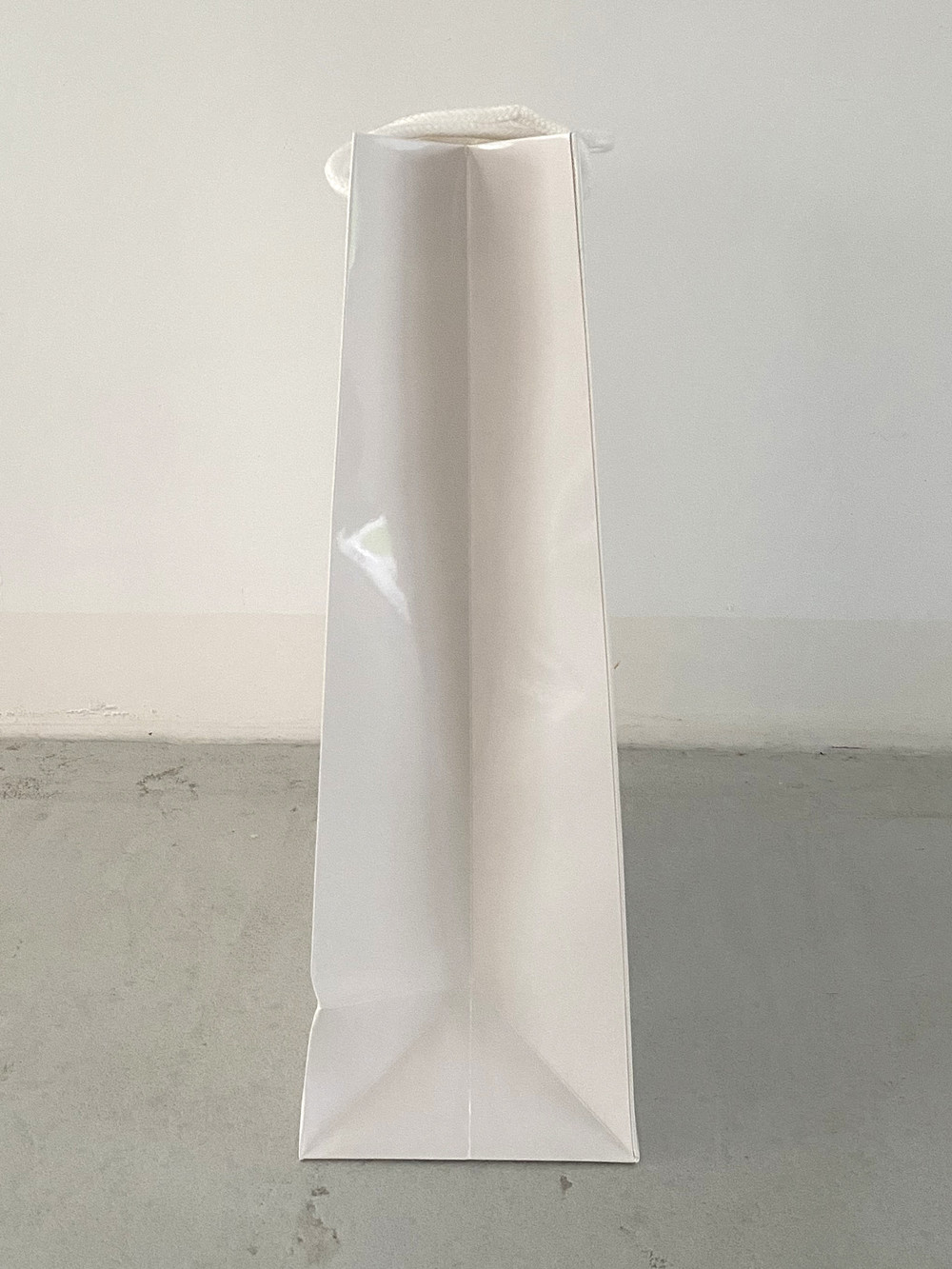 C.O.S.Y by SjaalMania Papiergeschenktüte glänzend weiß