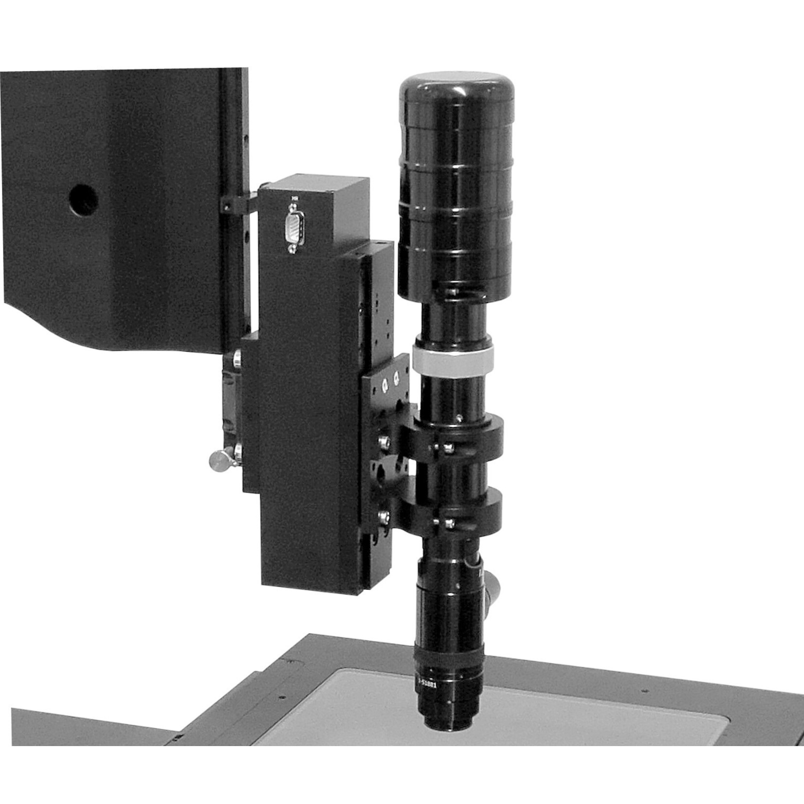 Video microscope with zoom optics, cross measuring table, and measuring software