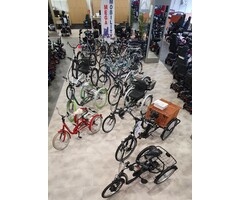 Driewielfietsen en tandems.