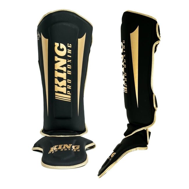 King Pro Boxing REVO-6 Scheenbeschermers – Zwart/Goud – Voor Kickboksen & Sparren