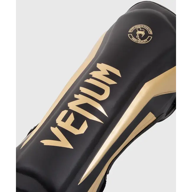 Venum Elite Standup Scheenbeschermers – Black/Gold – Skintex