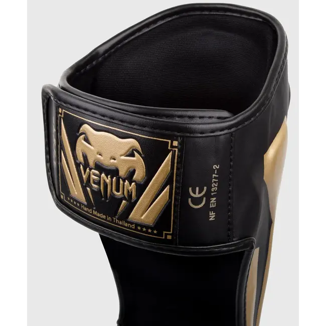 Venum Elite Standup Scheenbeschermers – Black/Gold – Skintex