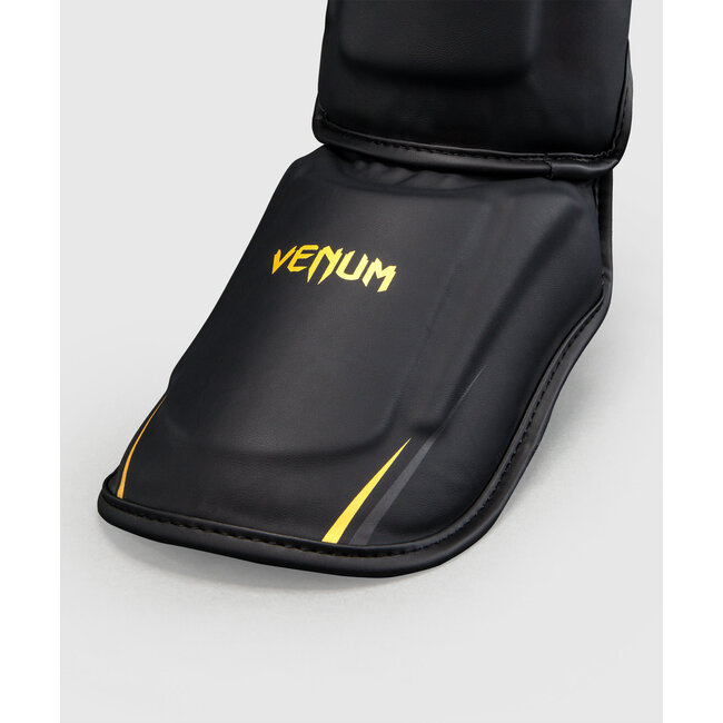 Venum G-Core Scheenbeschermers – Zwart/Goud
