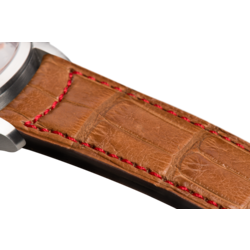 Bracelet plein en alligator doré surpiqué rouge