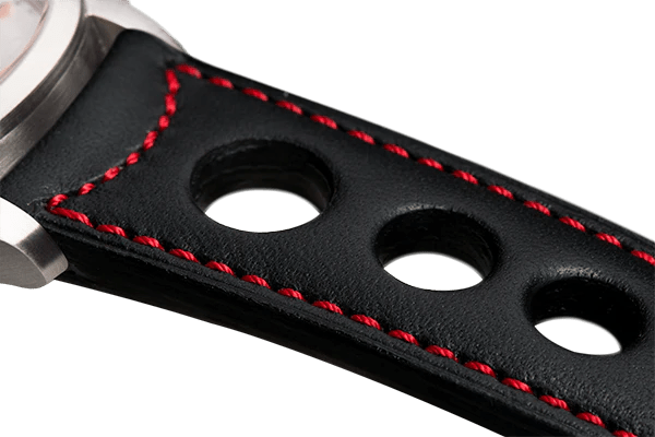 Bracelet aéré en cuir noir surpiqué rouge