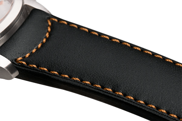 Bracelet plein en cuir noir surpiqué brun