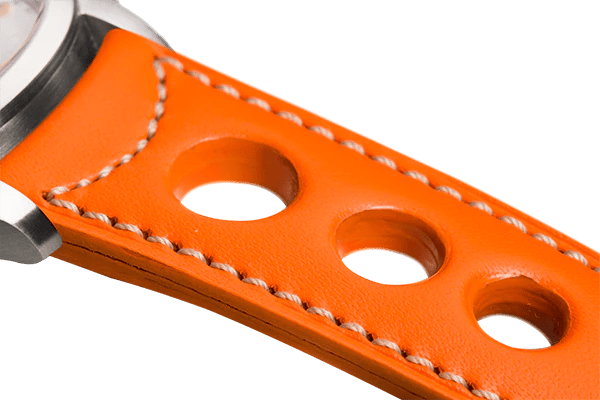 Bracelet aéré en cuir orange surpiqué écru