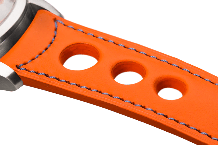 Bracelet aéré en cuir orange surpiqué bleu