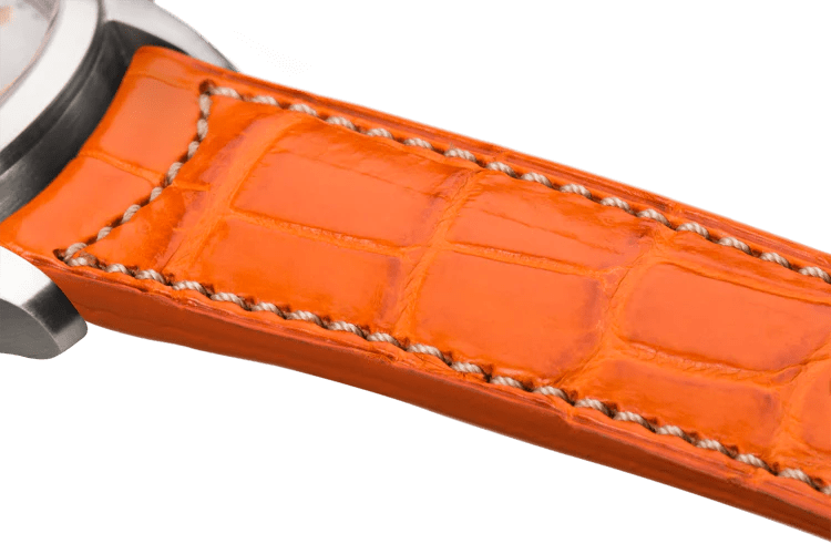 Bracelet plein en alligator orange surpiqué écru