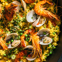 Paella with shrimp, mussels and peas recipe