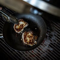 Prevent food from sticking in a carbon steel pan