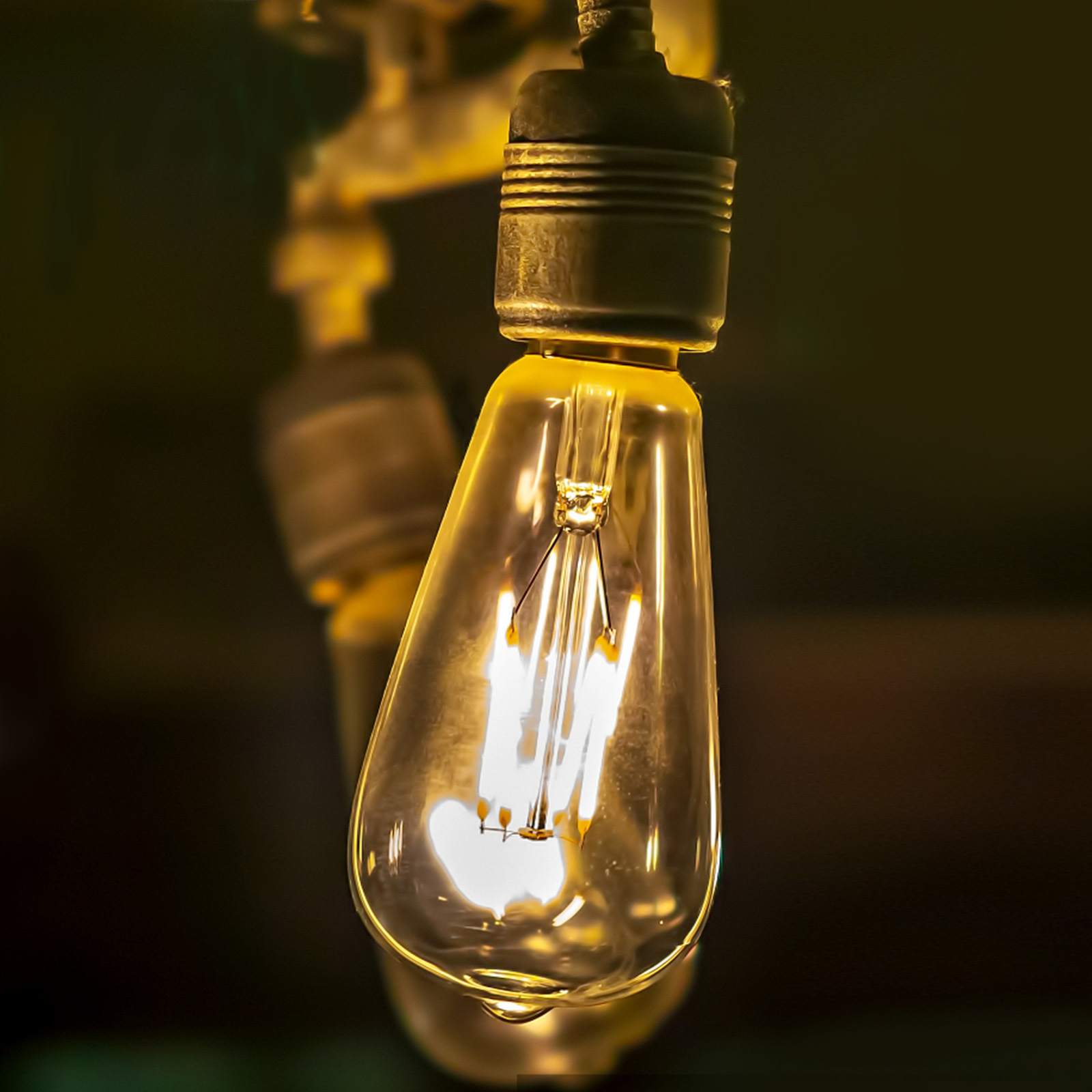 Kooldraadlamp E27 Edison ST64 - amber glas | LED 4W=38W gloeilamp | FLAME filament 2200K