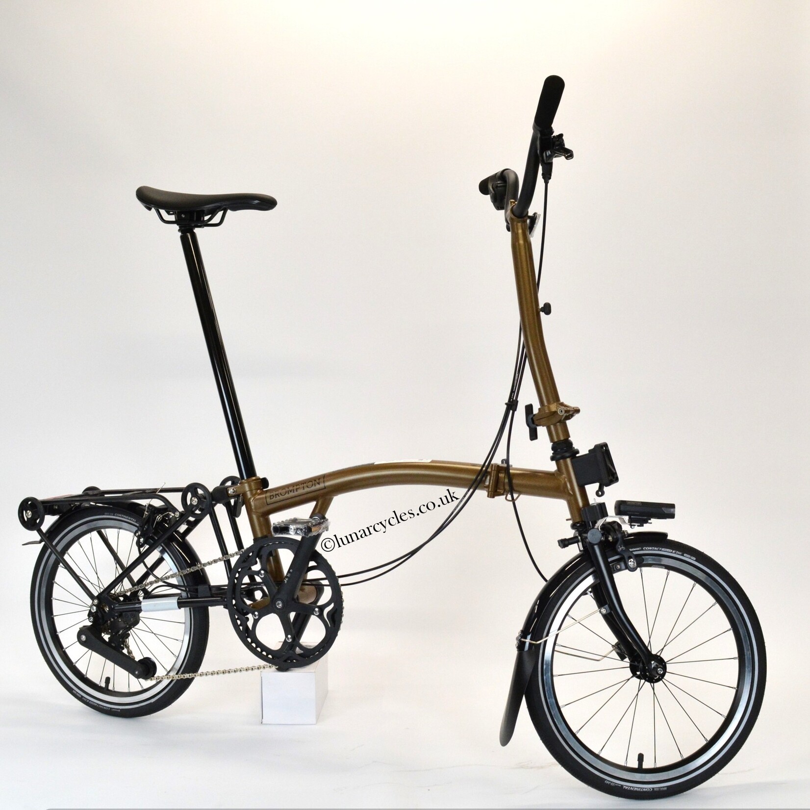 H4R0MBBB6COC P Line Urban High Bronze Sky with roller rack battery lights Continental tyres extended seatpost Superlight saddle with steel rails carrier block Lunar Cycles Ltd