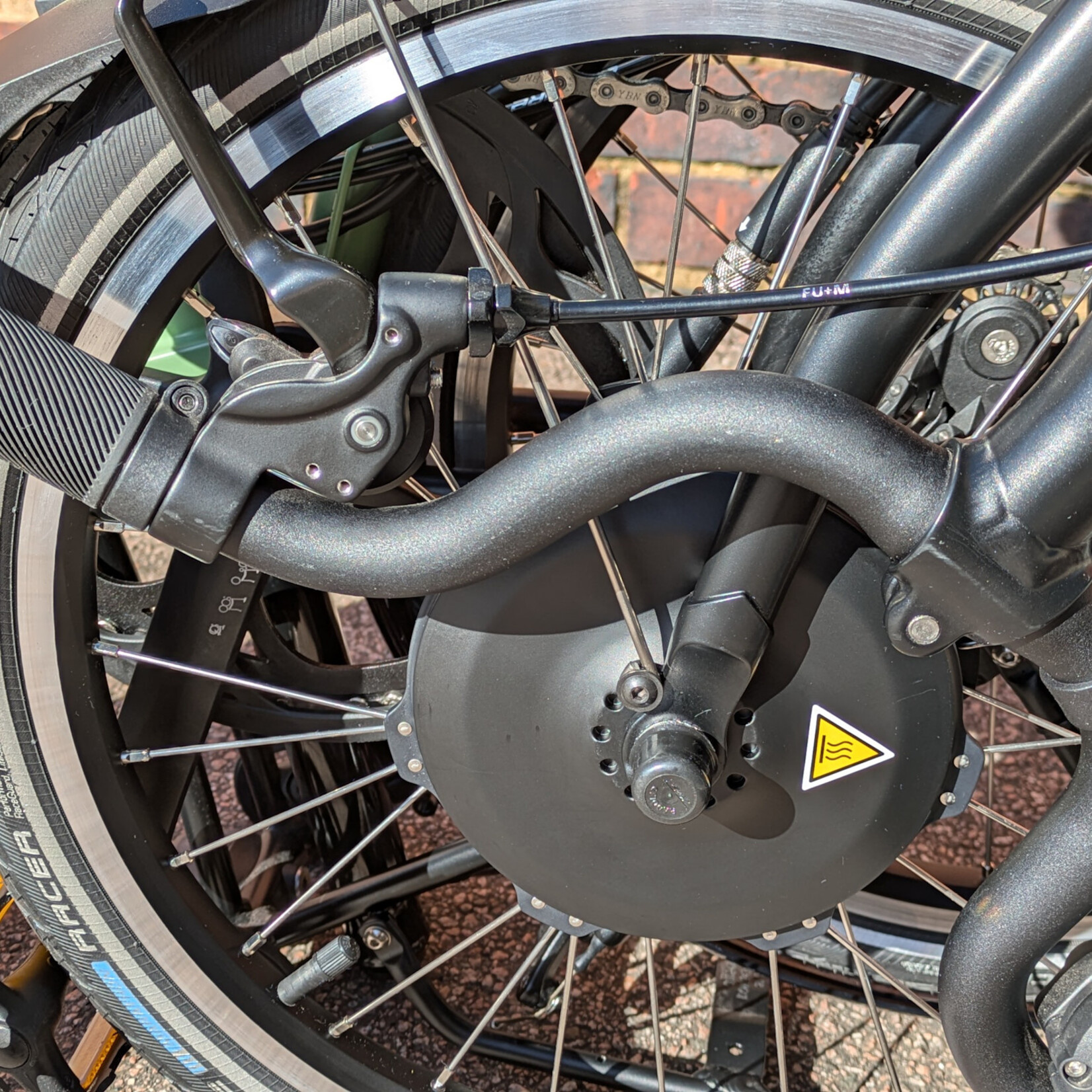 Brompton EX-DEMO Electric C Line 4 Speed Mid Folding Bike with Roller Rack - Matcha Green and Black