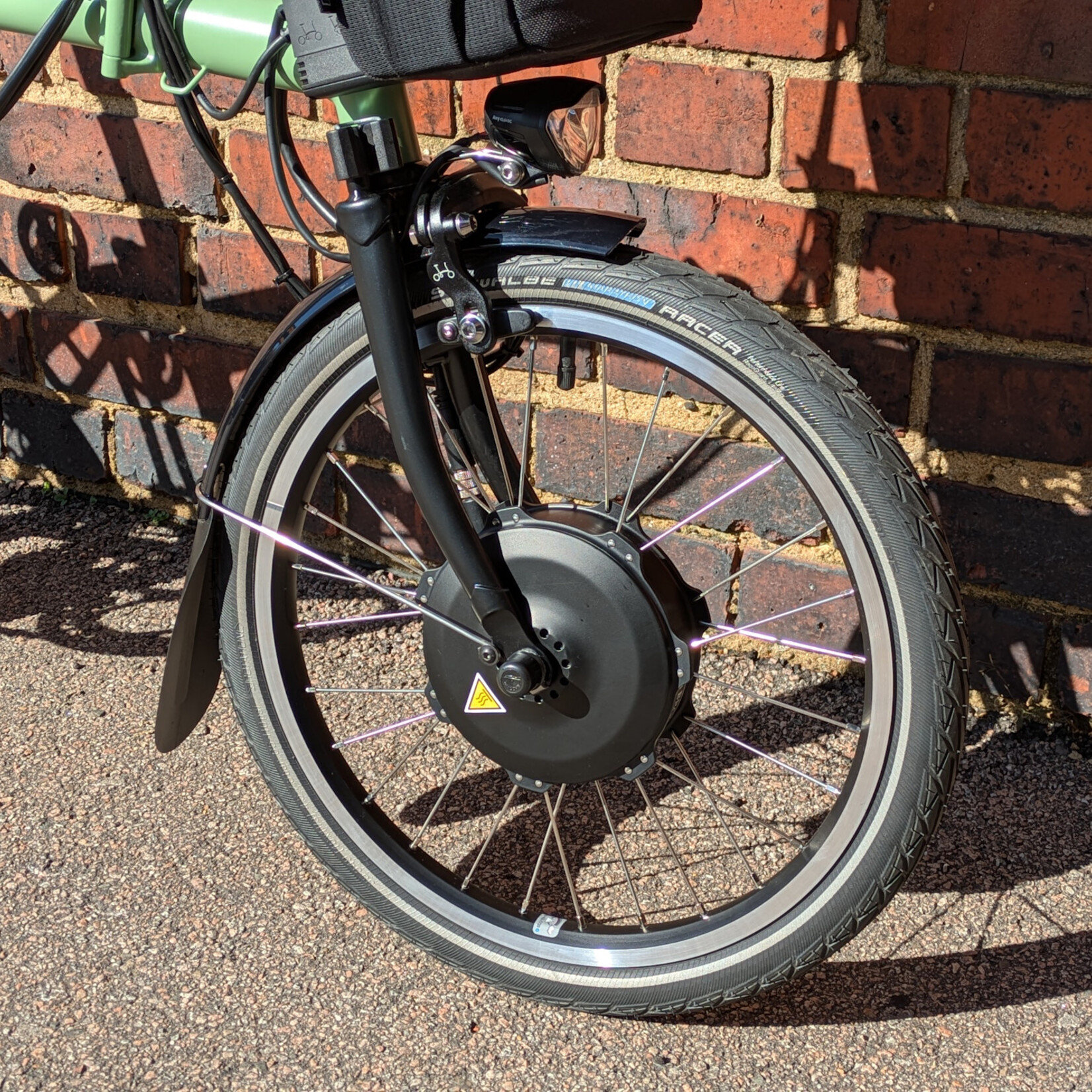 Brompton EX-DEMO Electric C Line 4 Speed Mid Folding Bike with Roller Rack - Matcha Green and Black