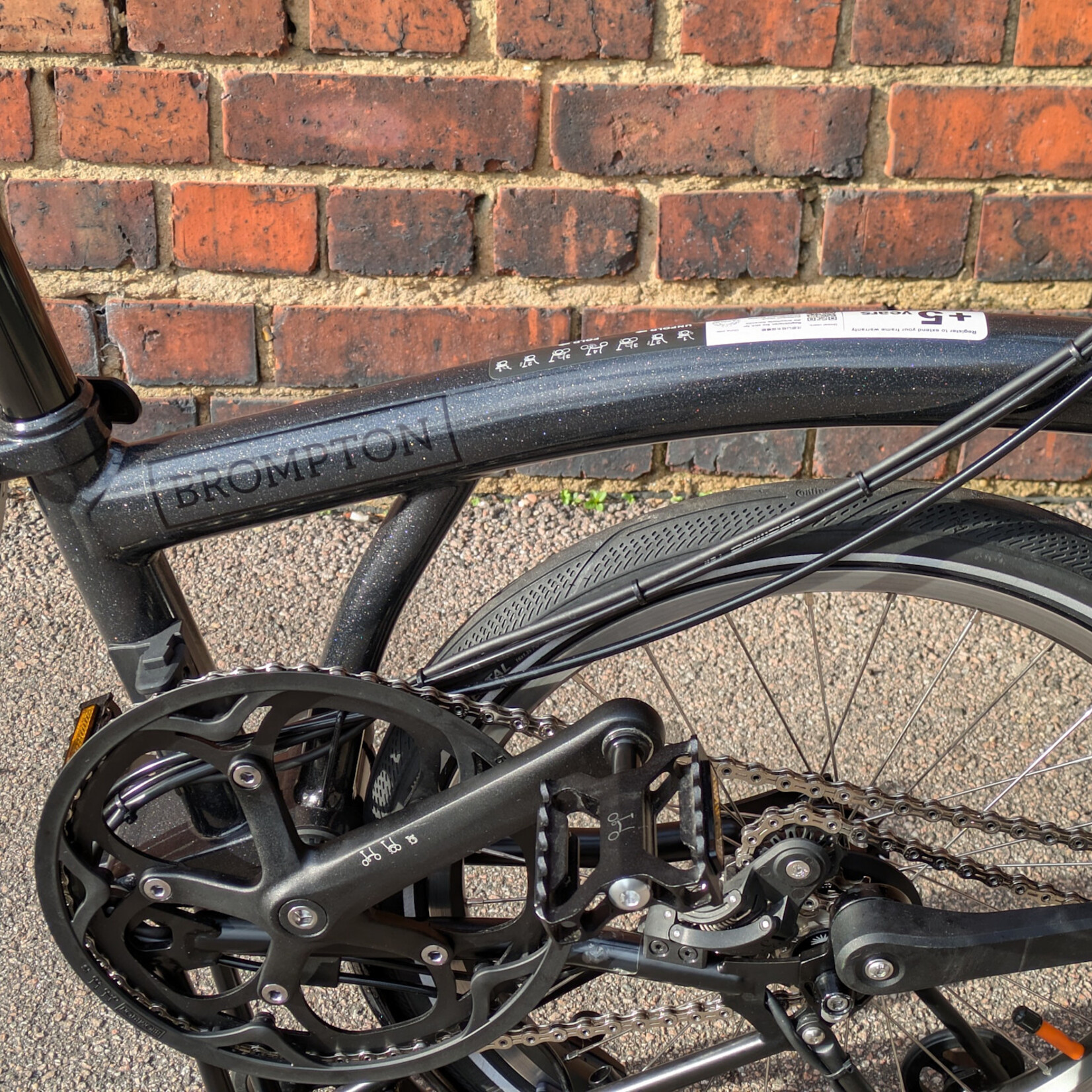 Brompton EX-DEMO Electric P Line 4 Speed High Folding Bike with Roller Rack - Midnight Black Metallic